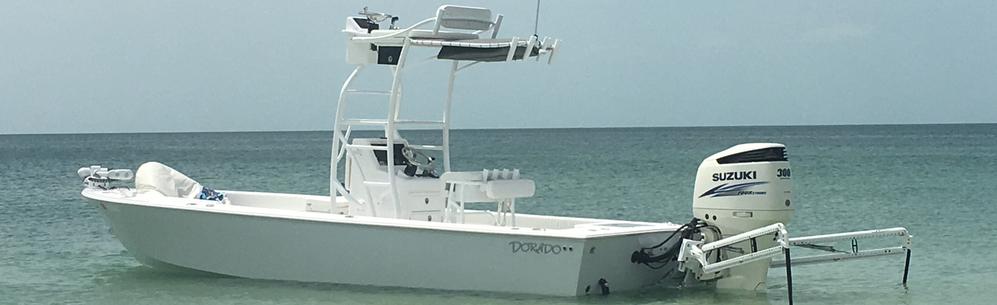 The 25 foot custom Dorado with tower in clear water