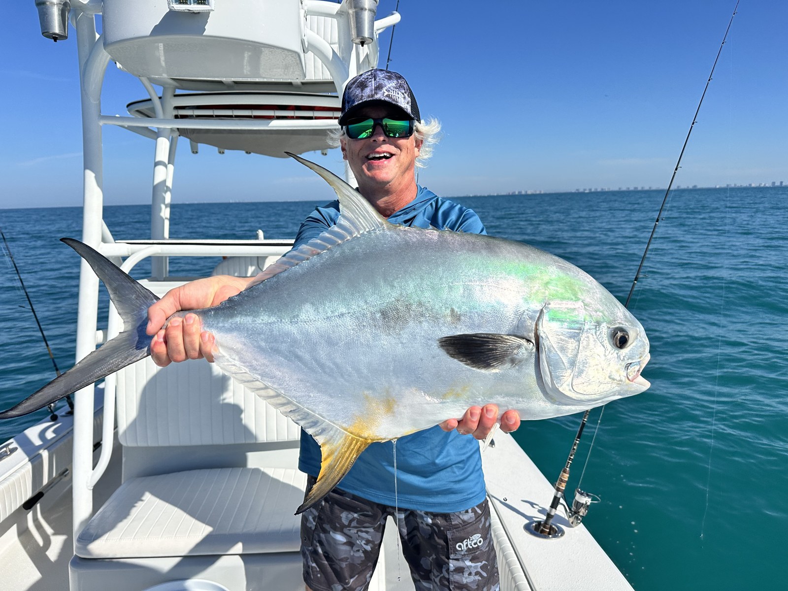 Angler with a big permit caught off Naples beaches